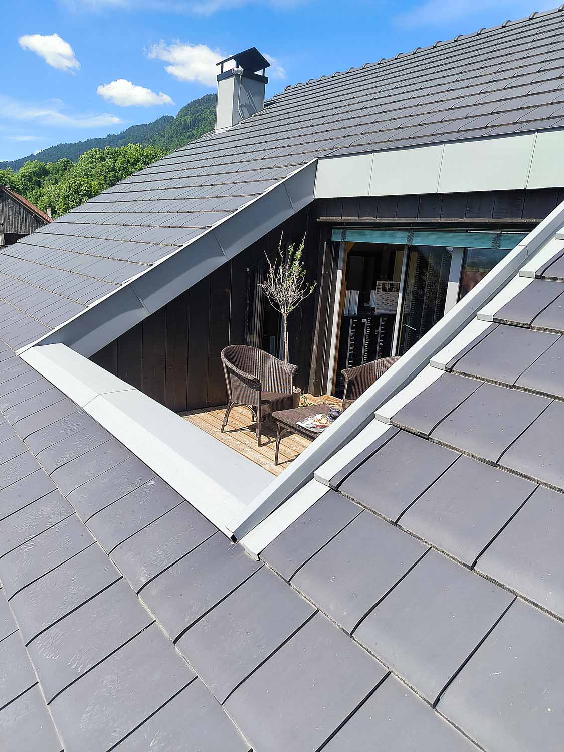 photo de la rénovation d'une terrasse sur un toit